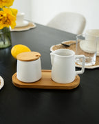 Set latte e zucchero con coperchio, cucchiaio e lattiera
