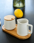 Set latte e zucchero con coperchio, cucchiaio e lattiera