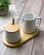 Set latte e zucchero con coperchio, cucchiaio e lattiera