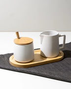 Set latte e zucchero con coperchio, cucchiaio e lattiera